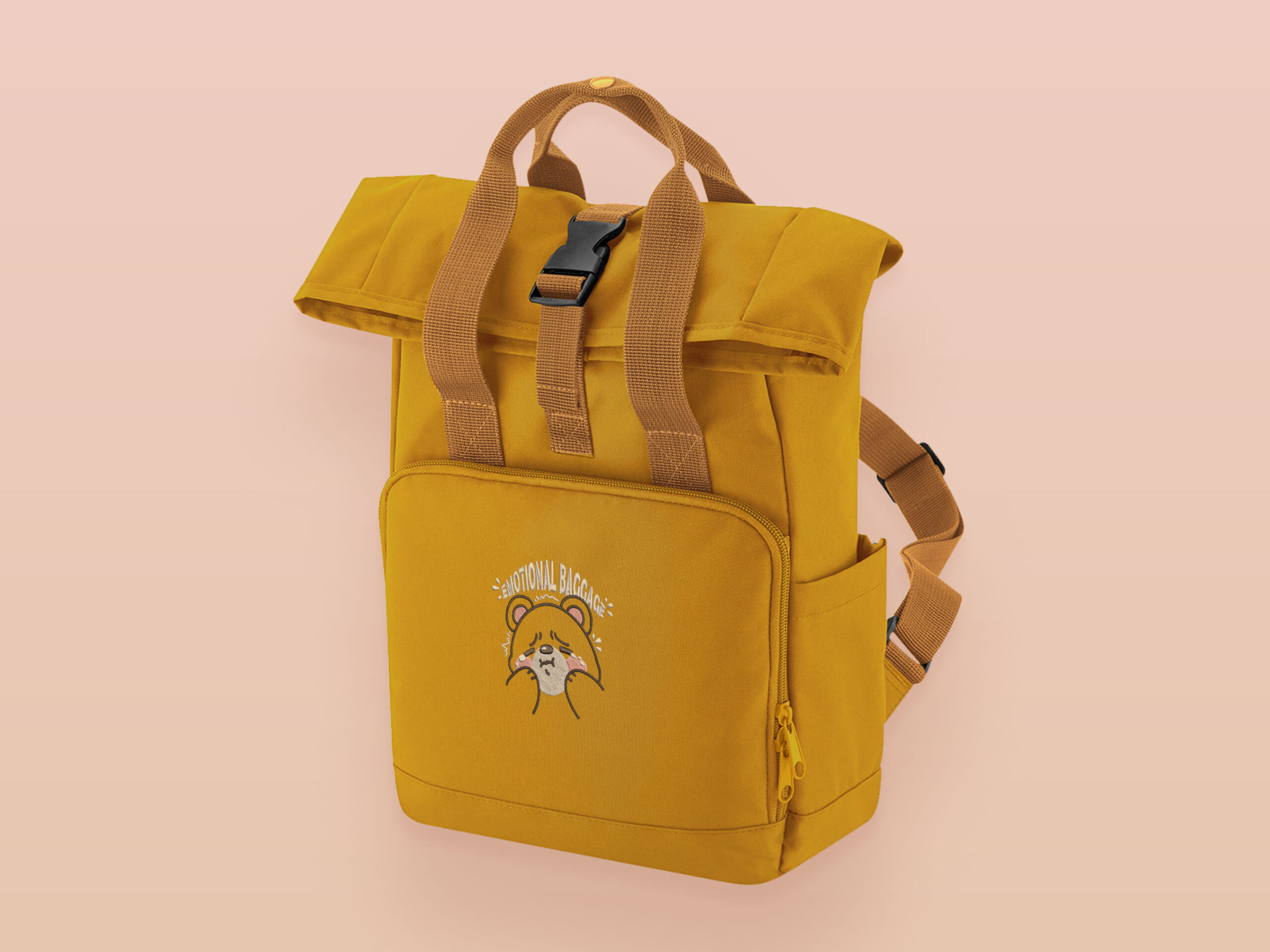 Emotional Baggage Bear Small Yellow Backpack by Nona Gallery 1 Yellow roll top twin handle backpack with an embroided design of cute crying bear and the quote emotional baggage