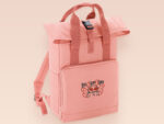 Pink roll top backpack with a front pocket and an embroided mothman cryptid design with the lext live lamp lurk
