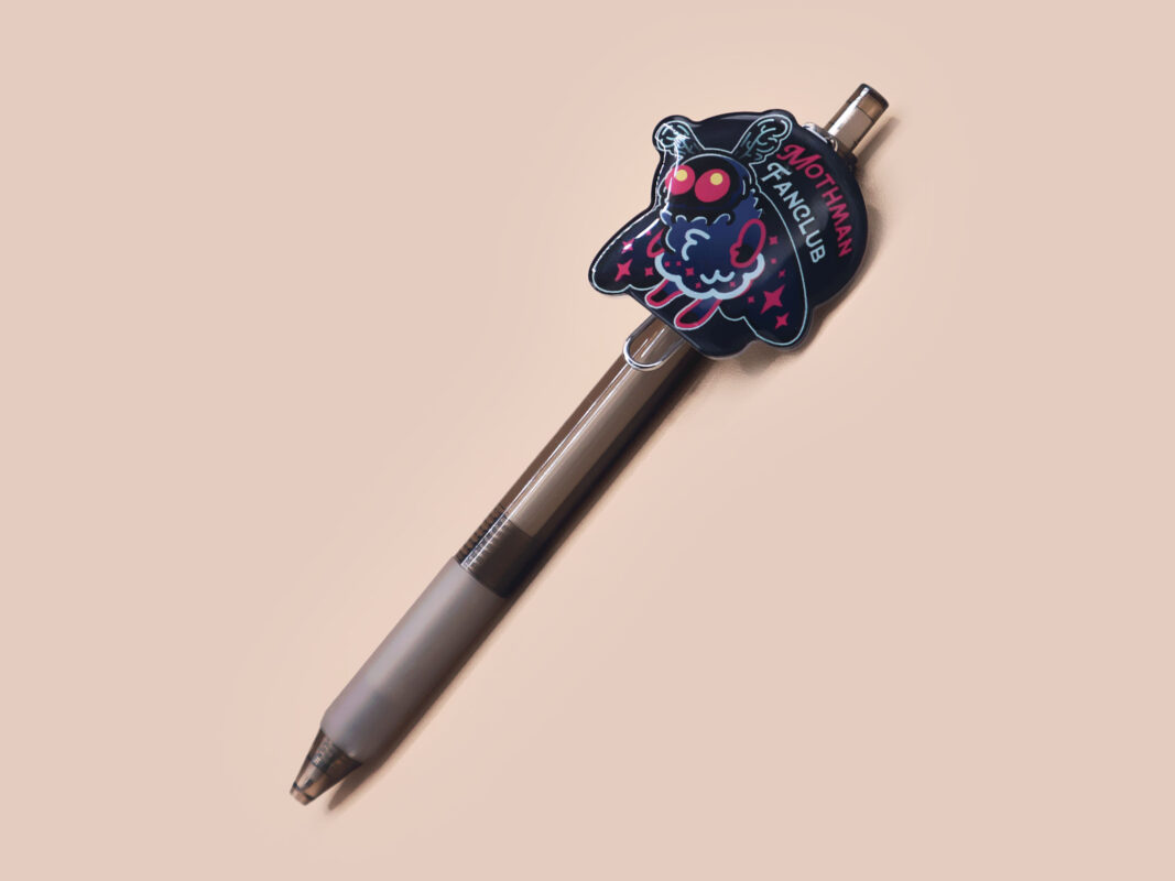 Black ballpoint pen with black ink and a cute chibi mothman cryptid fanclub design.