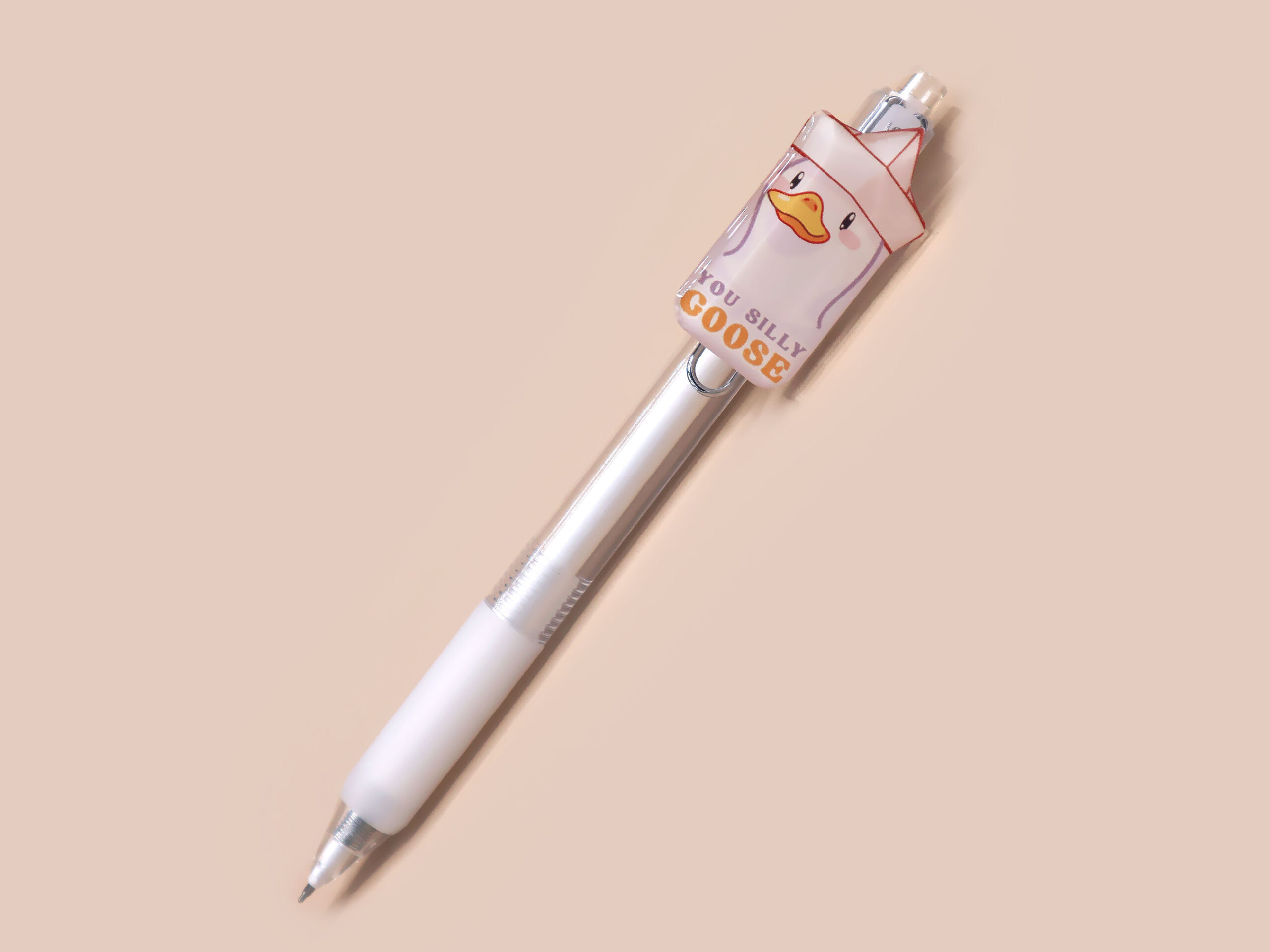 You Silly Goose Black Ink White Pen By Nona Gallery 1 White ballpoint pen with black ink and a cute silly goose design.