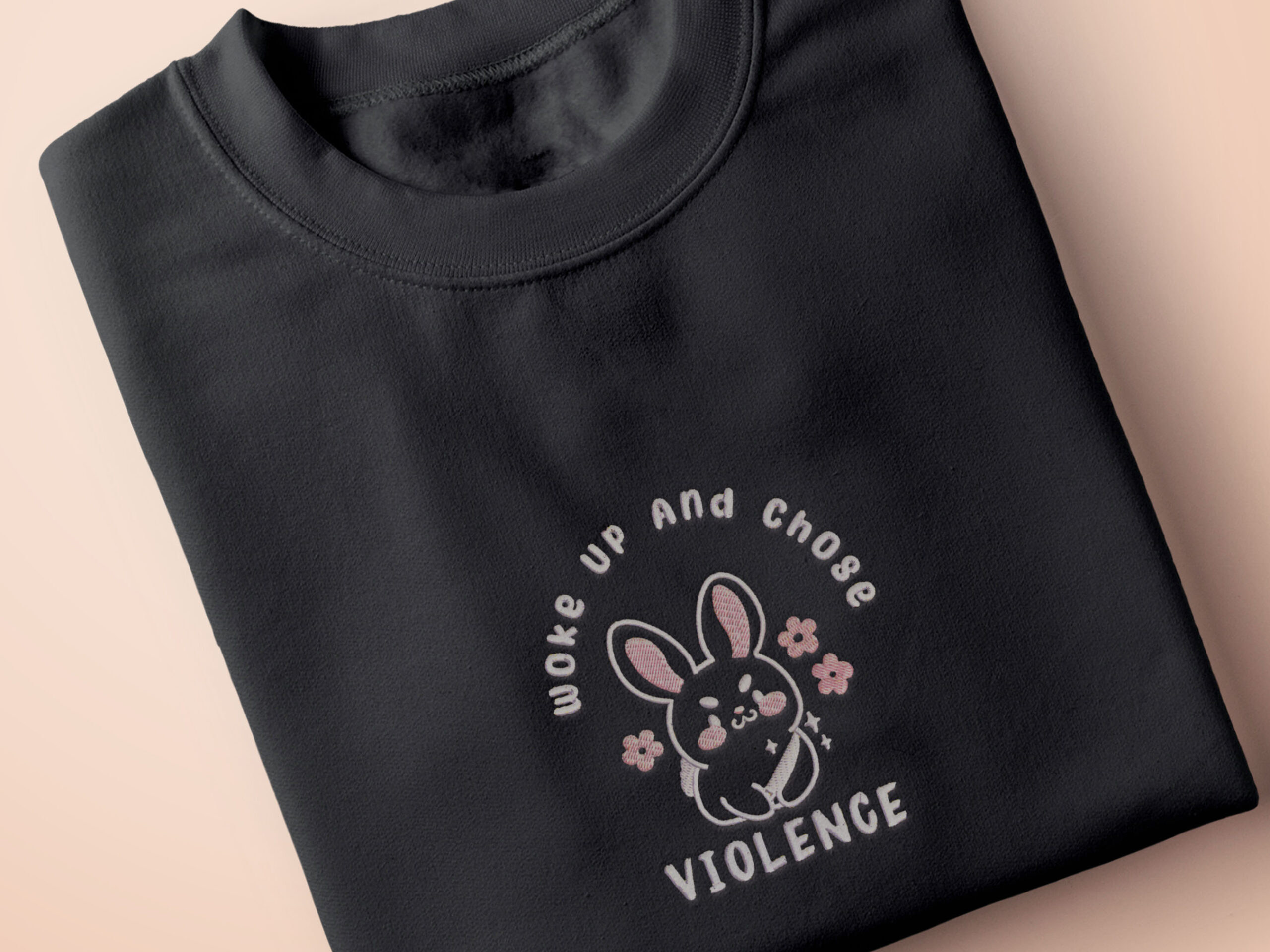 Embroidered Dark Grey Top Tshirt Design Fun Cute Stylish I Woke Up And Chose Violence Chibi Bunny Rabbit With Knife Meme Funny Motif by Nona Gallery Thumbnail 1 An embroidered dark grey t-shirt with a cute chibi bunny and the text Woke Up And Chose Violence.